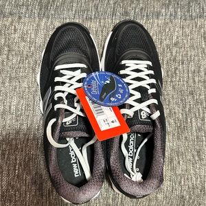 BRAND NEW WITH TAGS!  NewBalance Women’s size 9 golf shoes!